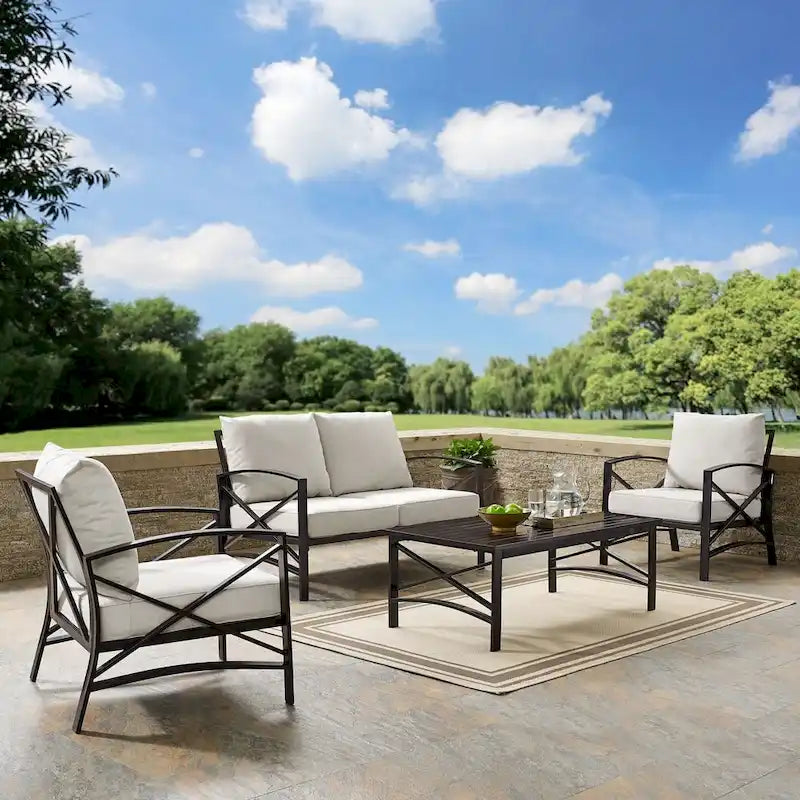 Crosley kaplan 4 pc outdoor seating set with oatmeal cushion - loveseat, two chairs, coffee table - 138.75 W x 72.19 D x 32 H